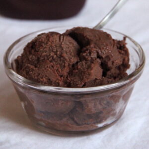Rich chocolate ice cream with brownie pieces swirled throughout — the perfect dessert for chocolate lovers! This lightened-up homemade ice cream recipe is incredibly easy to make too. With its irresistible flavor, it rarely lasts long! A great sweet treat for summer — or any day of the year!