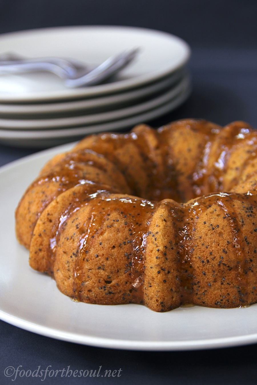 Orange Poppy Seed Bundt Cake. Easy, moist & incredibly flavorful. The perfect cake for any occasion!