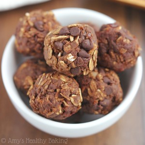 Looking for high protein snacks or healthy snack ideas? Make these chocolate cherry energy bites! These healthy protein balls are a super easy snack. They’re clean eating, gluten free, nut free, and vegan. Packed with protein, oats, and two types of chocolate, these protein energy balls taste like cookie dough! Add these no bake protein balls to your list of healthy snacks to make!