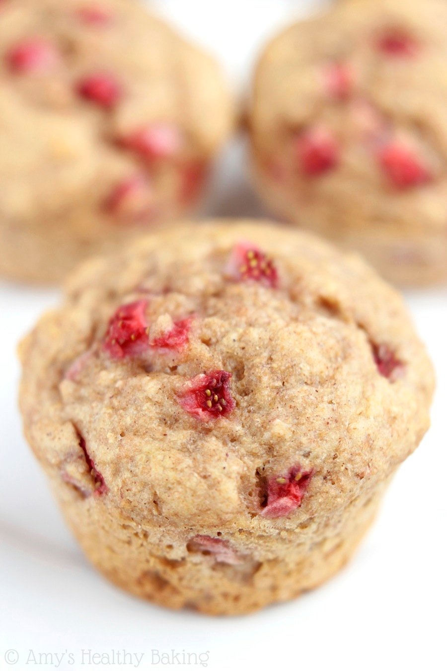 Whole Wheat Strawberry Banana Muffins -- the BEST I've ever made! They're 100% clean eating, but they don't taste healthy at all!