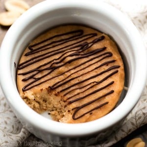 This healthy peanut butter mug cake is AMAZING! It tastes like a Reese's PB cup -- not healthy at all! Sweet, 8g+ of protein & completely guilt-free! Such a delicious single serving dessert!