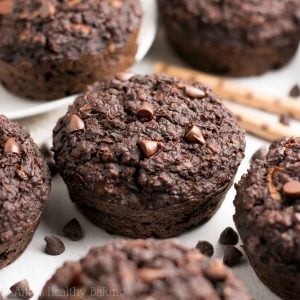 {HEALTHY!} Double Chocolate Bran Muffins -- they practically taste like brownies, for just 105 calories! SO rich & chocolaty, and they're so easy to make! (No mixer needed!) Totally kid-approved and freezer-friendly! #healthy #breakfast #recipe #muffins #cleaneating