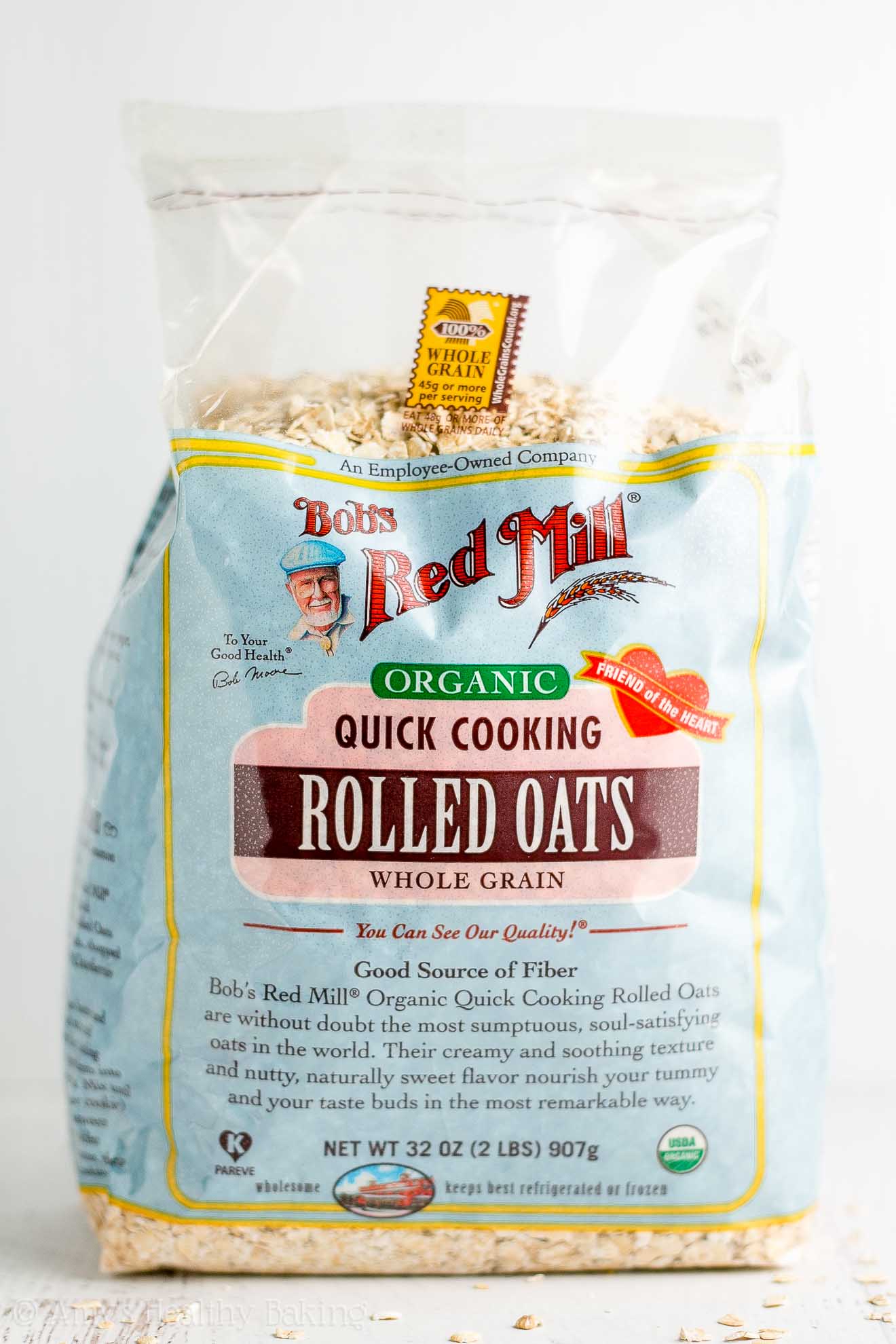 a bag of Bob's Red Mill organic quick cooking rolled oats, about to be turned into a healthy zucchini oatmeal snack cake – easy recipe for a healthy zucchini cake full of oats and spices – low calorie, low fat, soft, moist, and clean eating with whole wheat and gluten free options – made with greek yogurt, pure maple syrup, and no refined sugar