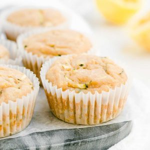 These healthy lemon zucchini muffins are SO easy to make & under 100 calories! Soft, moist & super flavorful. My family is OBSESSED with these — we LOVE this flavor combo! ♡ lemon zucchini muffins recipe. healthy lemon muffins clean eating. zucchini muffins with lemon. healthy zucchini lemon muffins gluten free & whole wheat options. lemon zucchini muffins greek yogurt. easy lemon muffins recipe moist. sugar free lemon muffins recipe.