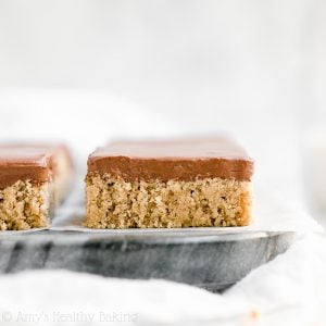 This healthy peanut butter cookie bars recipe is the BEST!! It’s so quick & simple to make. Topped with the EASIEST chocolate frosting too! They taste like buckeyes or peanut butter cups. Soft, chewy & NO butter or powdered sugar — even in the frosting! YUM! (gluten free, clean eating & low calorie!) ♡ peanut butter bars with chocolate on top. healthy peanut butter bars clean eating. peanut butter bars gluten free. practically flourless peanut butter cookie bars with chocolate frosting.
