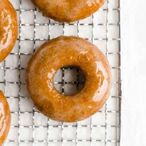 The BEST EVER Healthy Pumpkin Donuts Recipe! They’re 36 calories & baked, not fried! SO good & easy to make too! ♡ easy baked pumpkin donuts. best homemade pumpkin donuts. low calorie gluten free pumpkin donuts with vegan option. no sugar vanilla bean glaze.