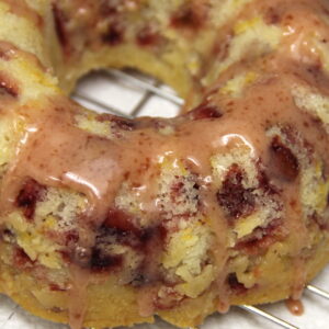This strawberry lemon bundt cake is easy to make and a true family favorite! Each supremely moist slice is filled with fruit flavor. The fresh strawberries pair perfectly with the bright sunshiny lemon, and an optional strawberry glaze adds an extra pop of flavor. The perfect simple spring and summer dessert!