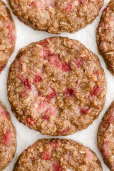 Looking for healthy snacks recipes or healthy breakfast ideas? Make these healthy strawberry oatmeal breakfast cookies! Soft, chewy & full of oats, these strawberry cookies are clean eating with a gluten free option. These healthy oatmeal cookies are easy too! Great healthy snacks for kids & healthy breakfast meal prep. These healthy sweet treats are our favorite yummy breakfast cookies. They’re the BEST oatmeal cookies! Add them to your list of healthy snacks to make!
