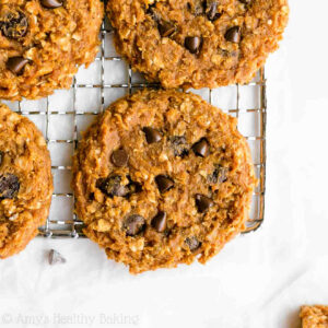 Looking for healthy desserts? Make these healthy oatmeal cookies! This fall treat features flourless pumpkin oatmeal cookies with chocolate chips that are perfectly soft & chewy. They’re the BEST pumpkin cookies! This easy healthy recipe is a healthy baking idea you won’t want to miss. Add it to your list of pumpkin desserts to make this season! Healthy flourless pumpkin chocolate chip oatmeal protein cookies recipe on amyshealthybaking.com. Gluten free, clean eating, high protein & no eggs!